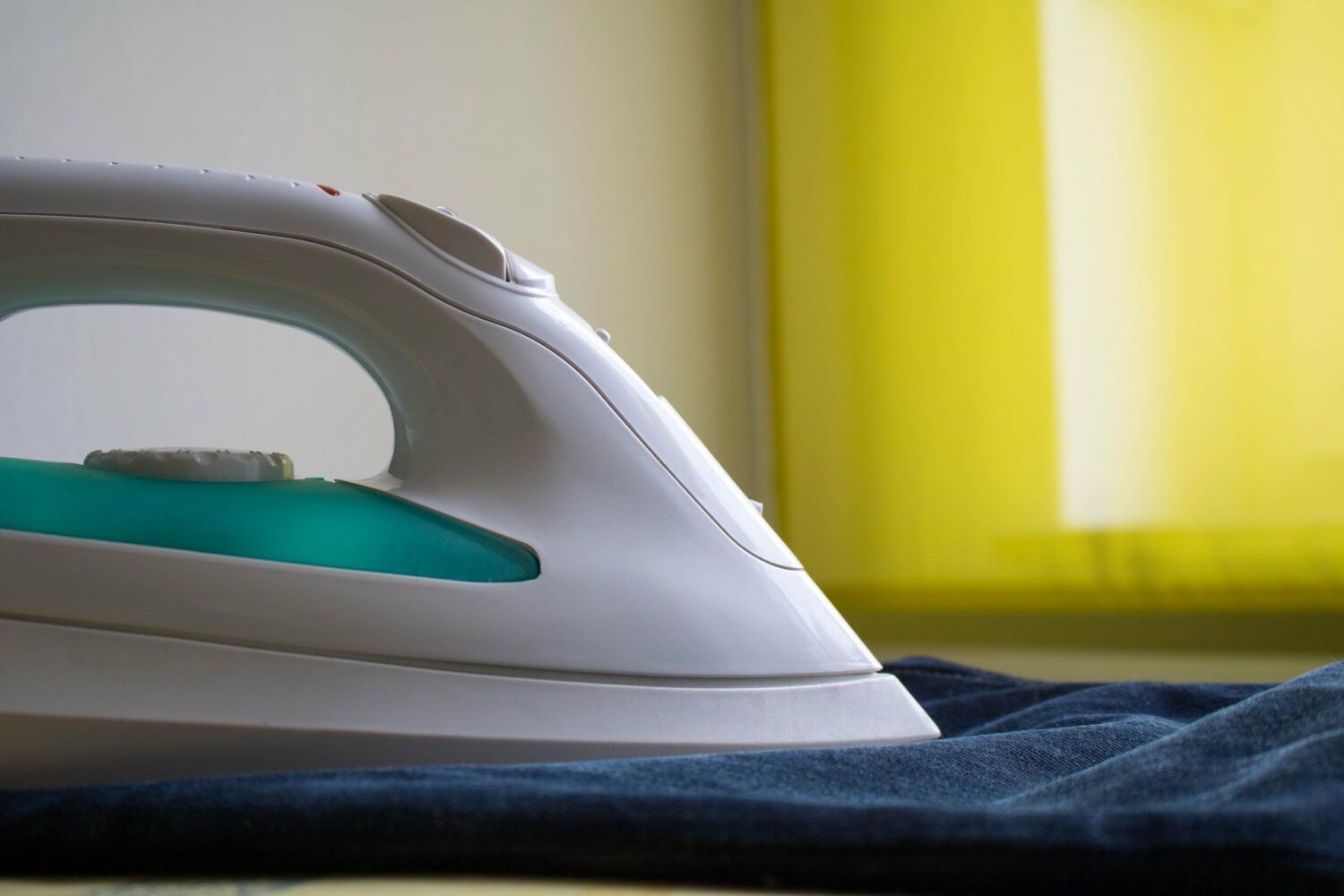 Man ironing jeans