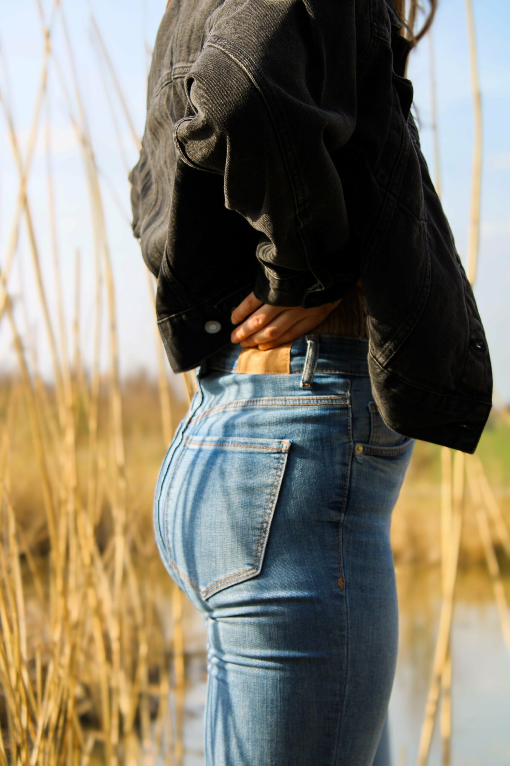 Woman flaunting high waist jeans