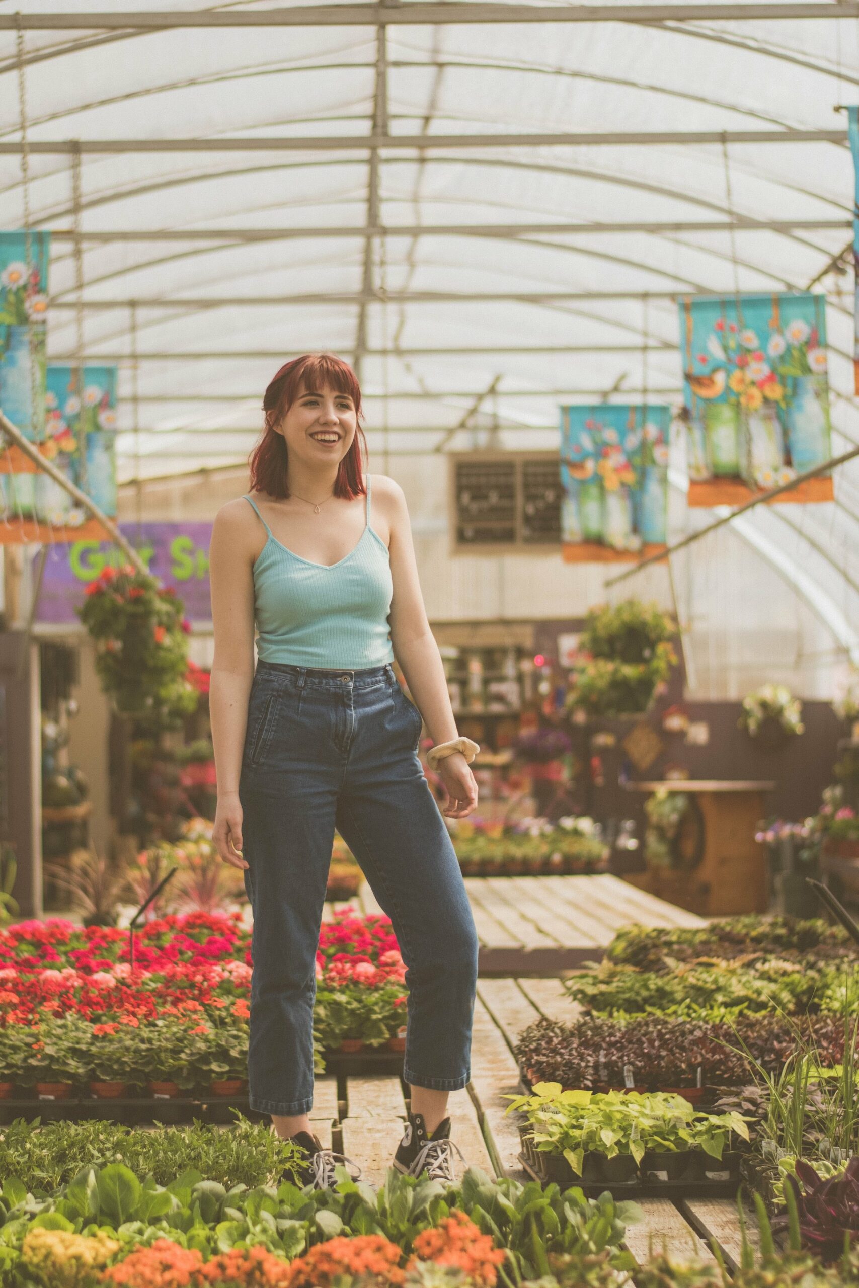 Woman wearing cami top and jeans