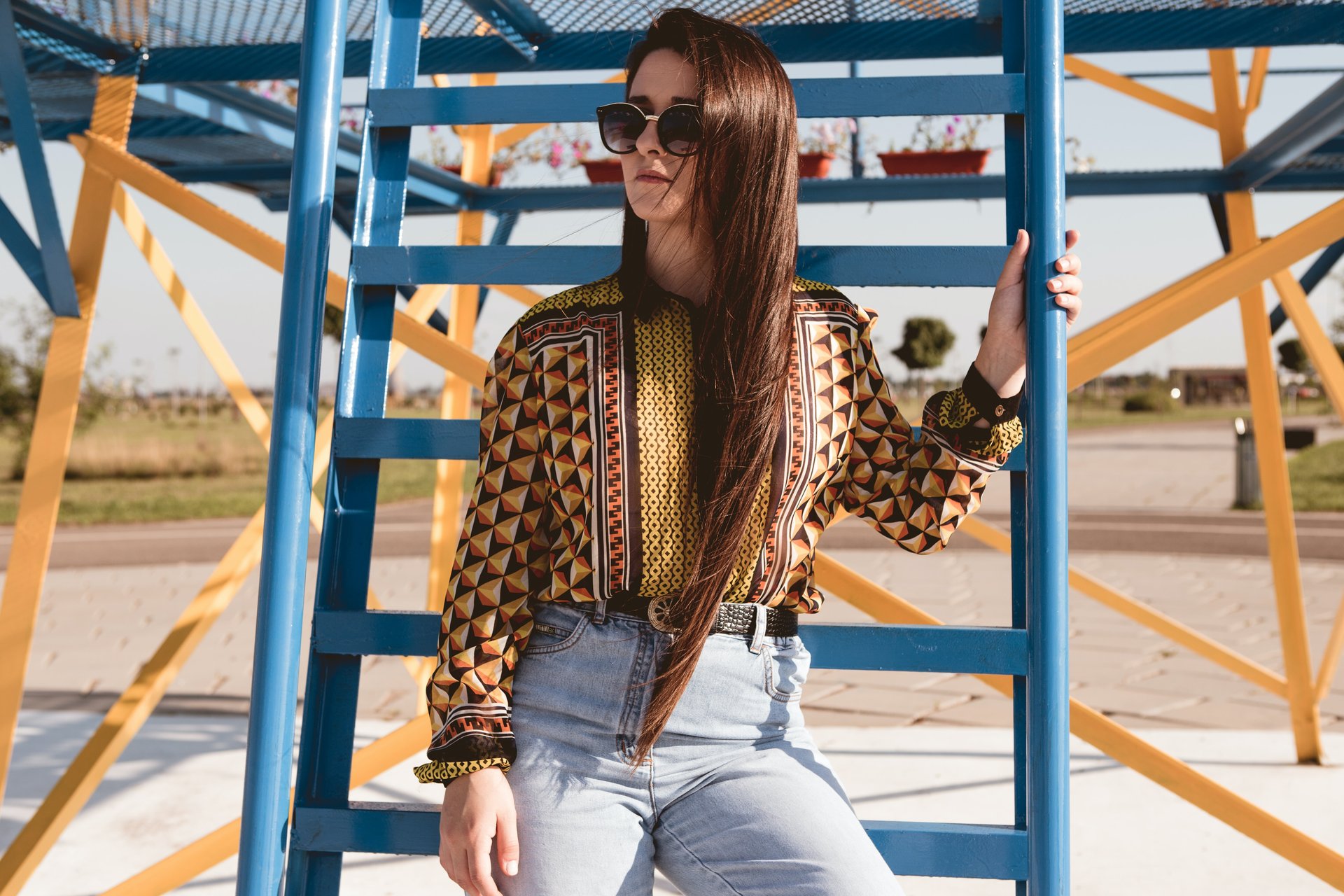 Woman wearing bold, printed top