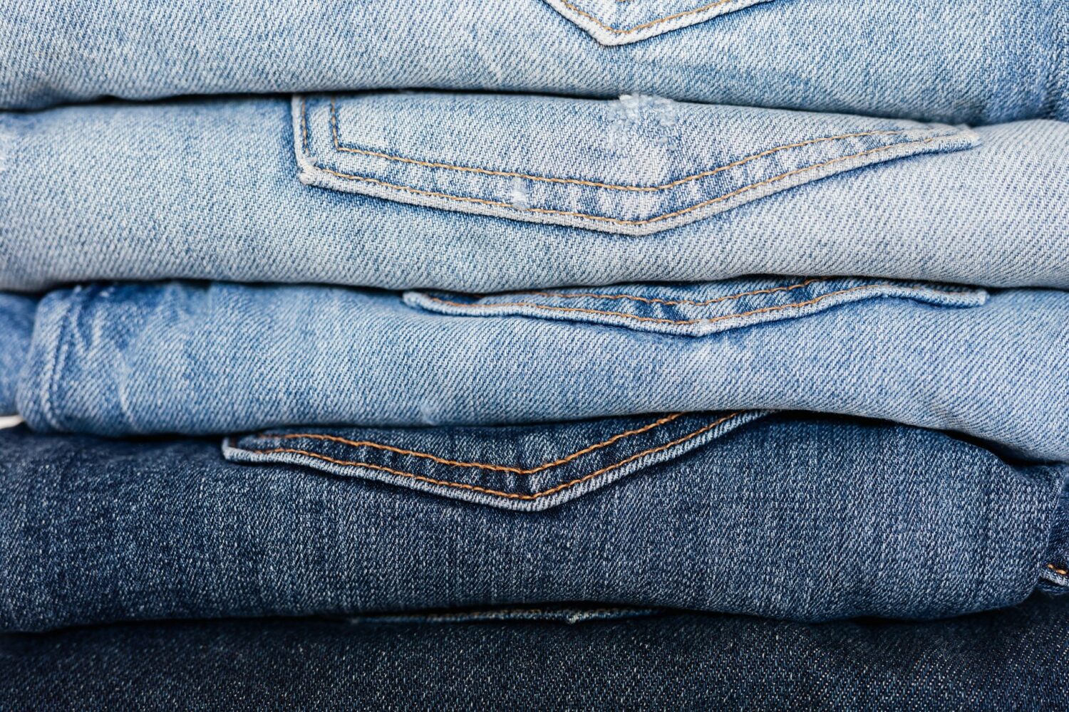 Stack of blue jeans