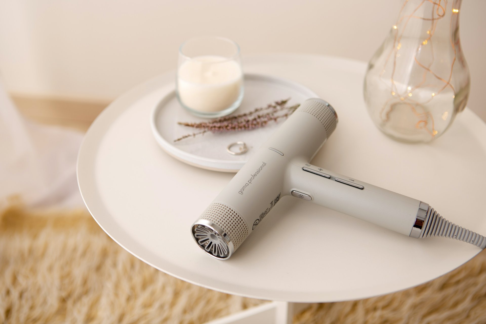 White hairdryer on a table