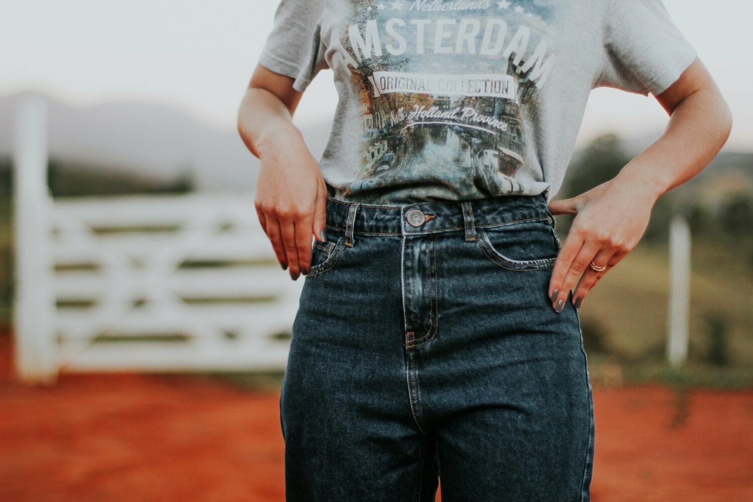 Woman wearing gray jeans