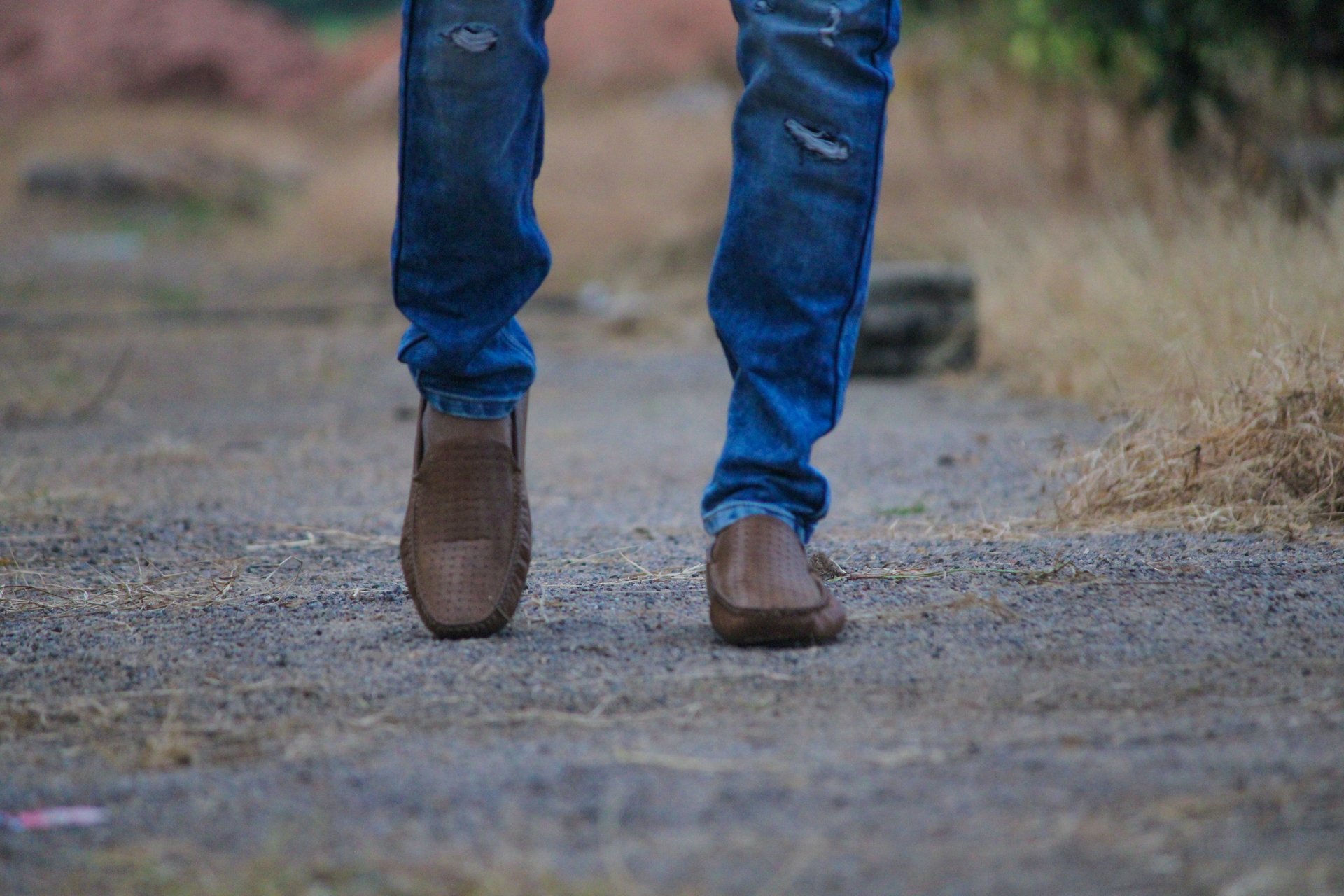 Man wearing jeans and loafers