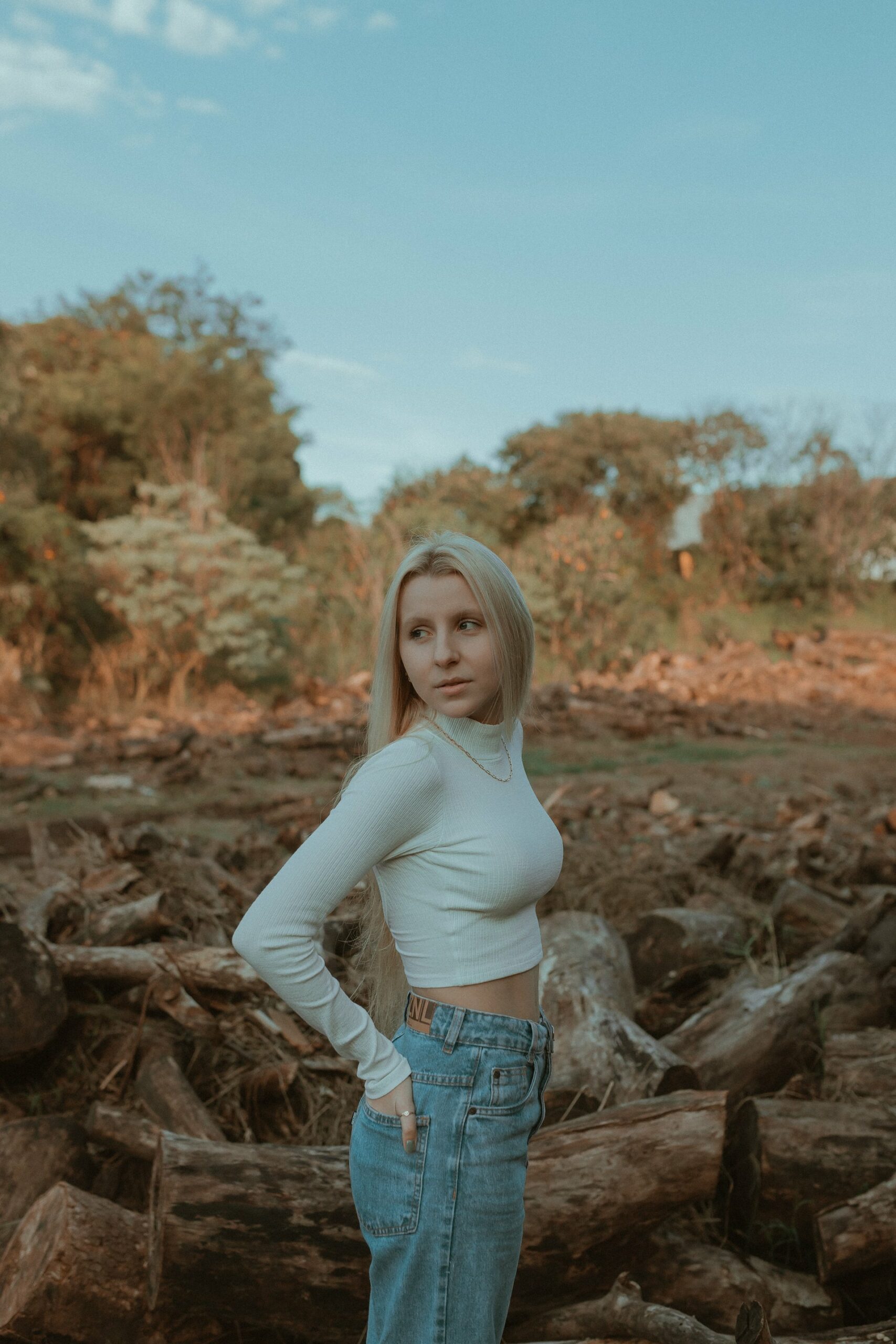 Woman wearing mom jeans, one of the best jeans for hourglass figure