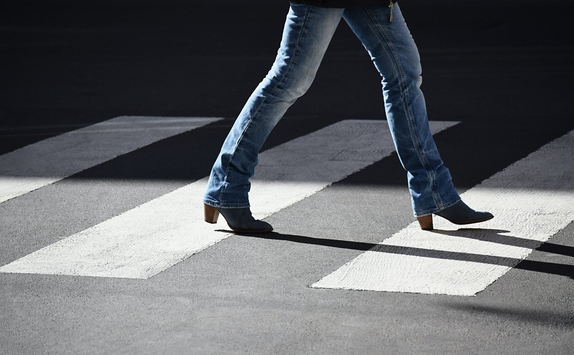 Man wearing bootcut jeans, one of the best men's jeans for big thighs