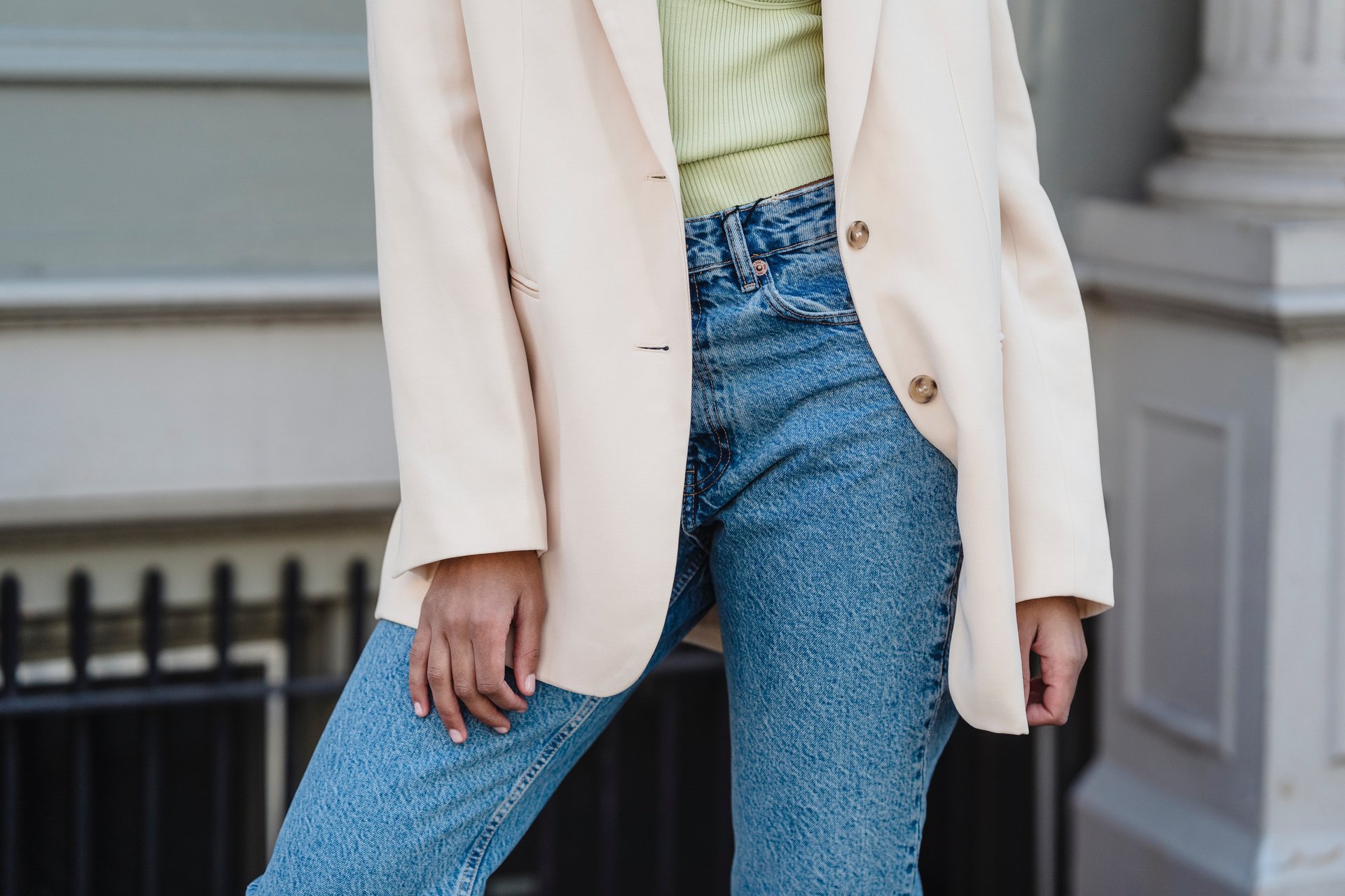 Woman wearing blazer with jeans