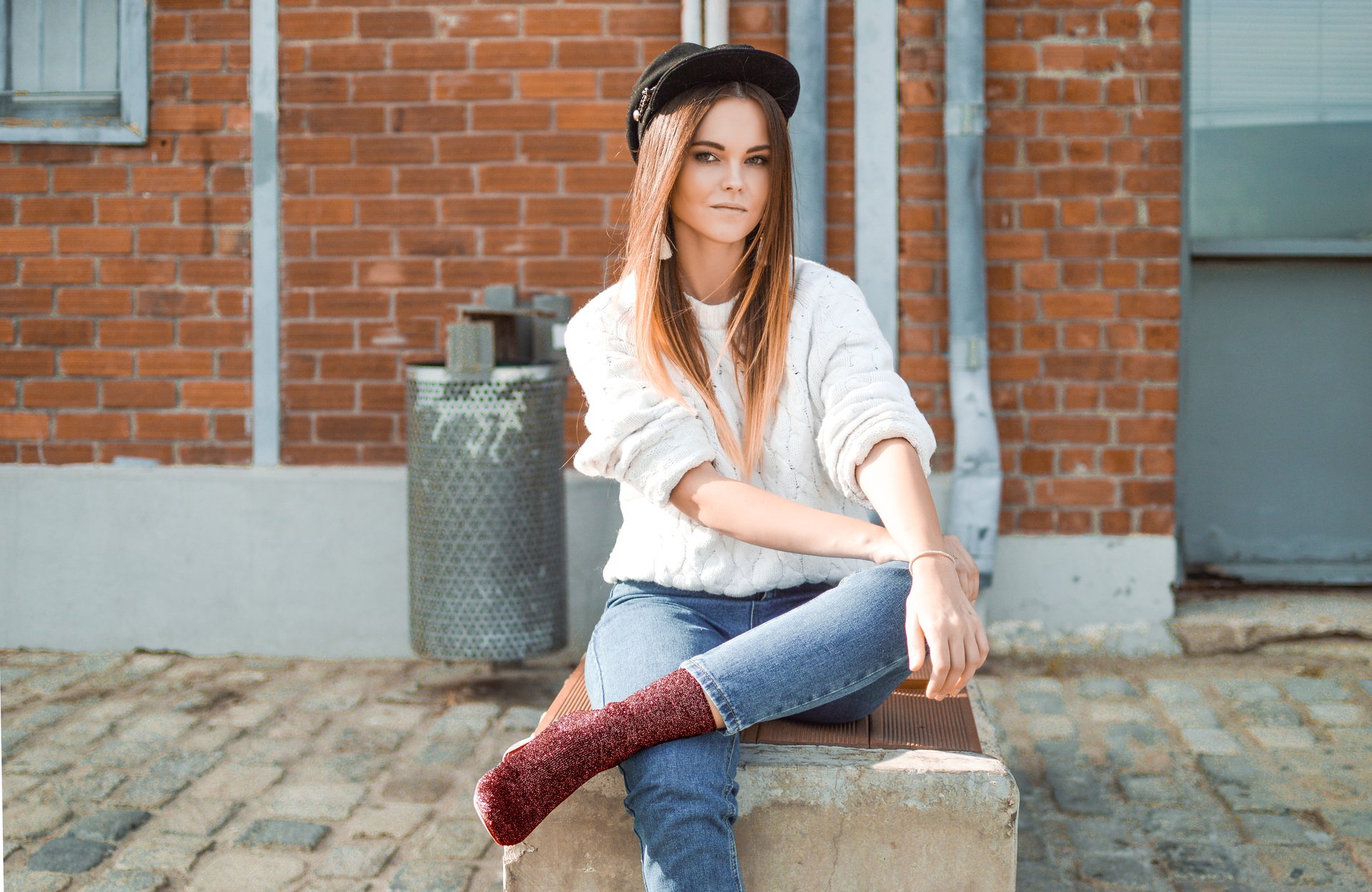 Woman wearing mid calf boots with jeans