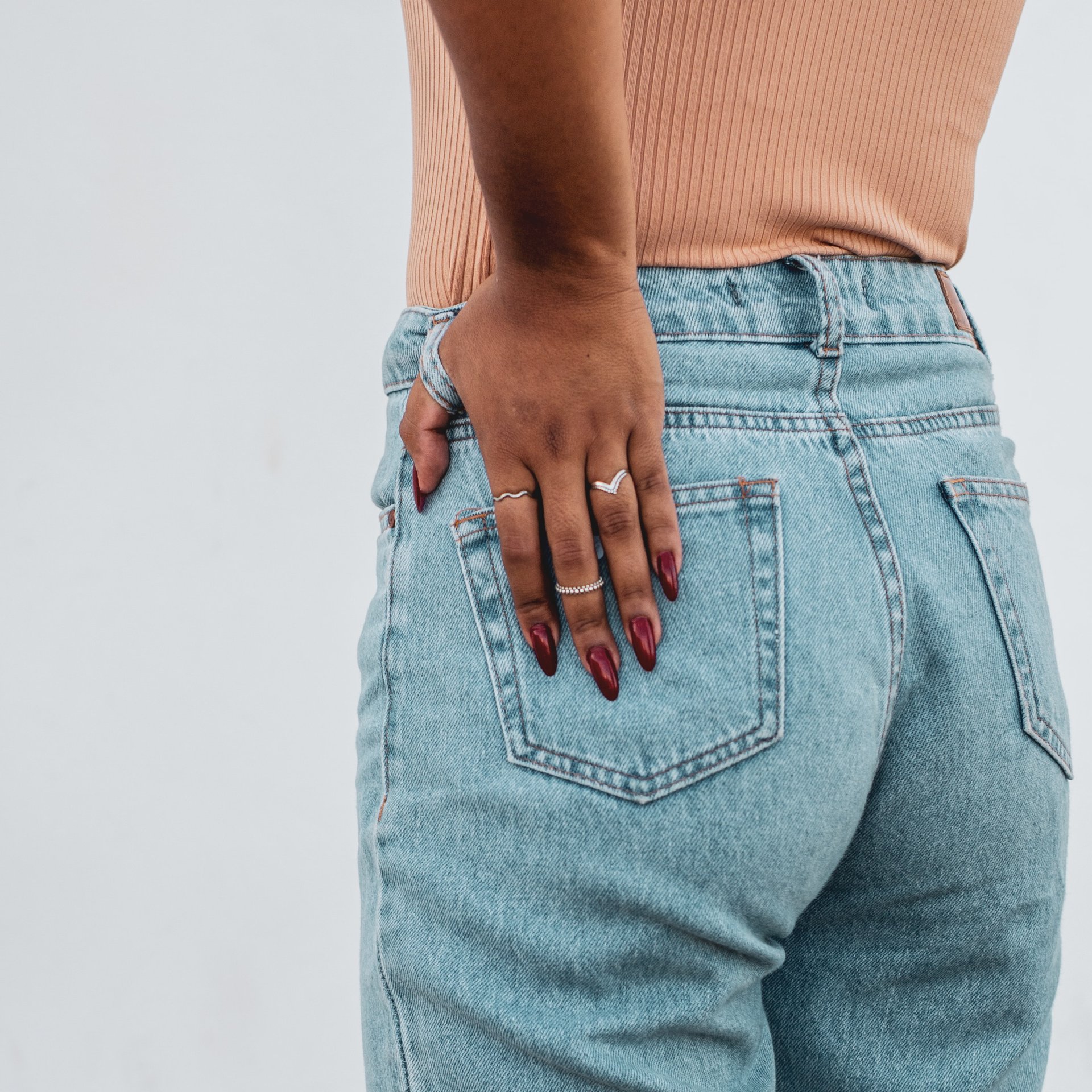 Woman wearing altered jeans