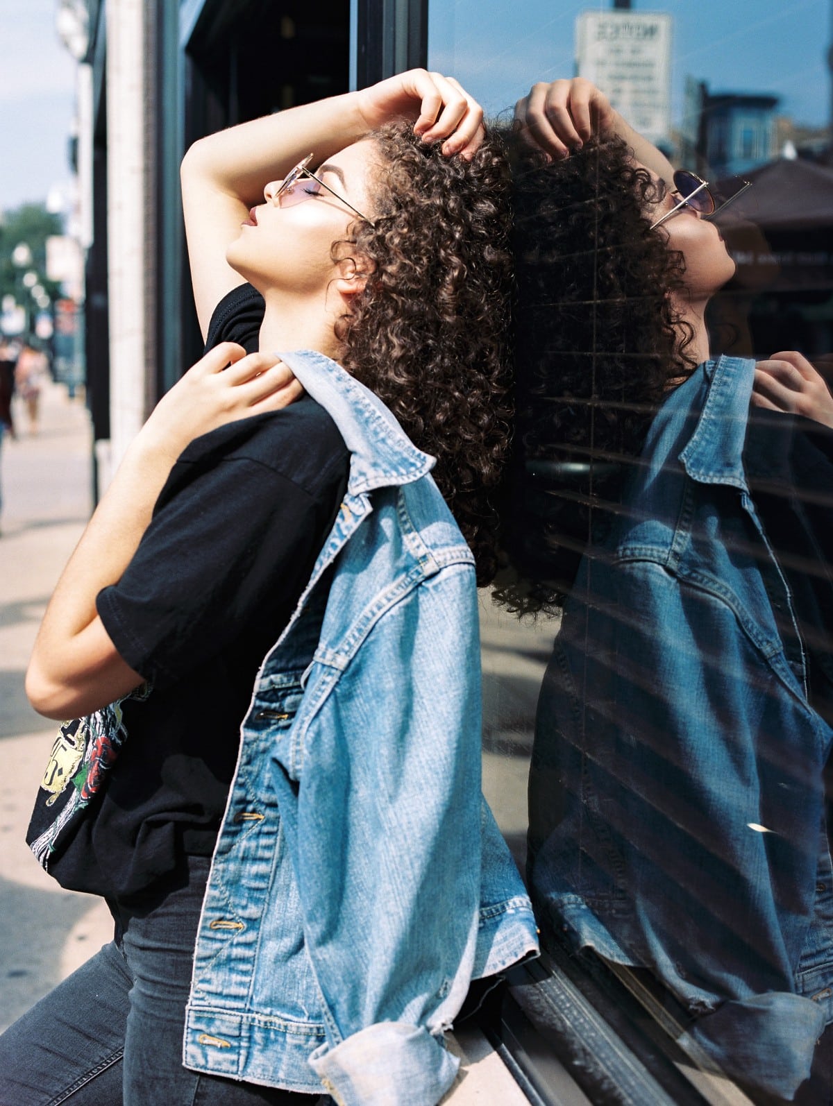 Woman wearing boyfriend jeans with oversized shirt