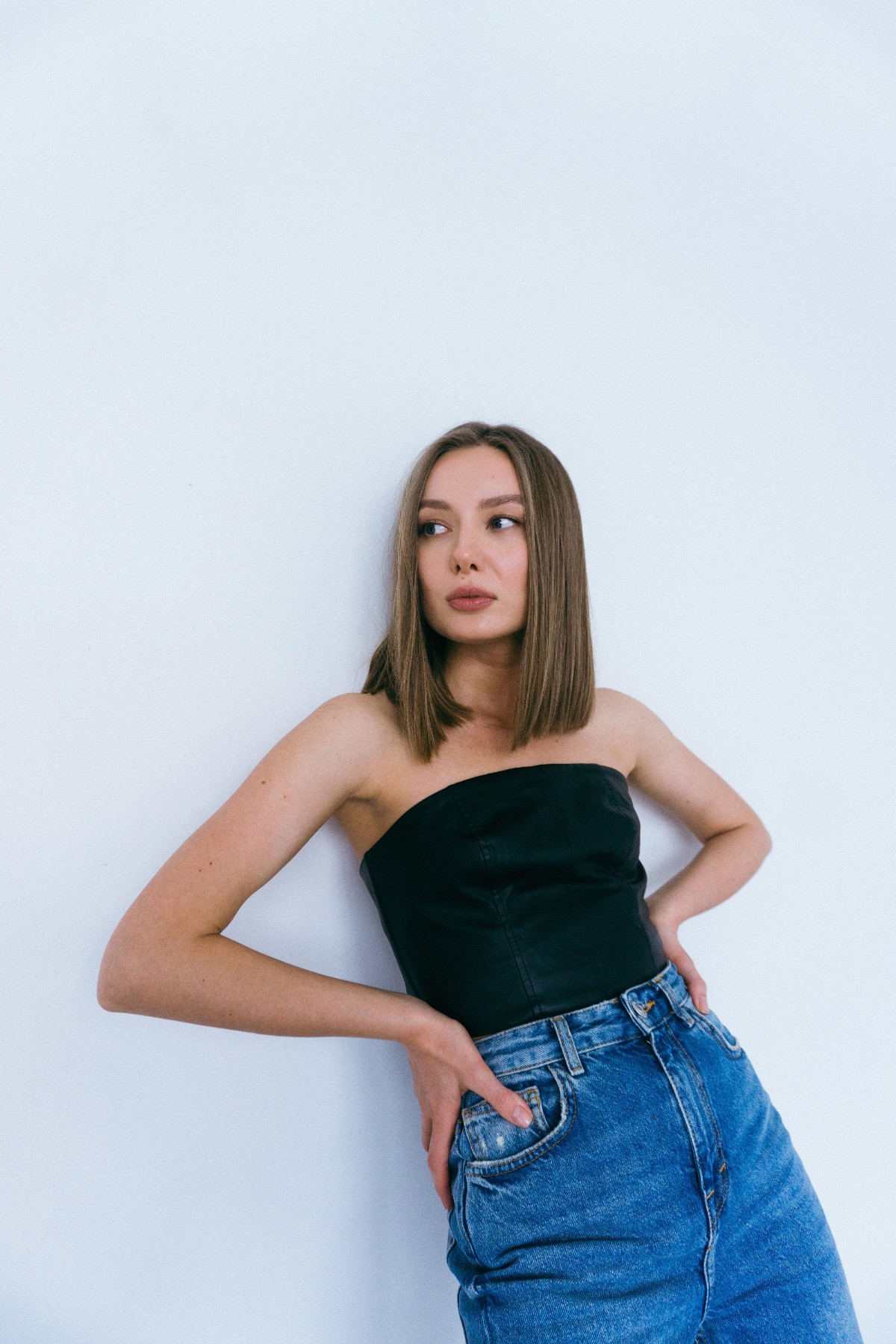 Woman wearing jeans and tube top